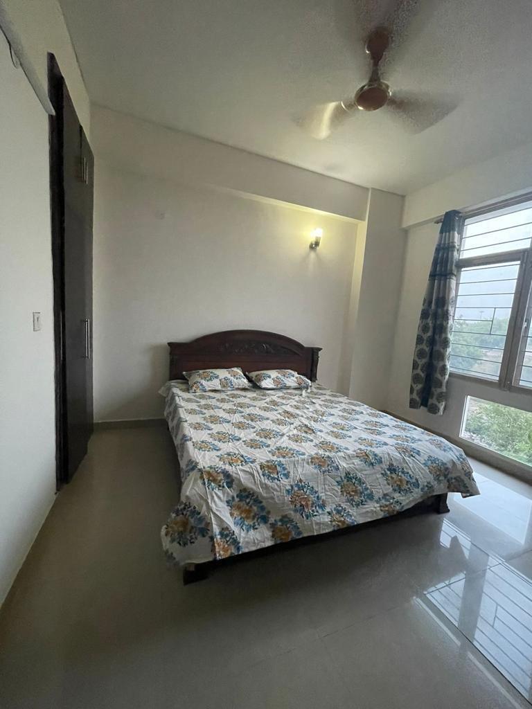 Spacious 2BHK + Study, 1100 sq. ft., in Eldeco Residency Greens, Greater Noida, with secure facilities, clubhouse, and green surroundings, available at Greaternoidaflats.com.