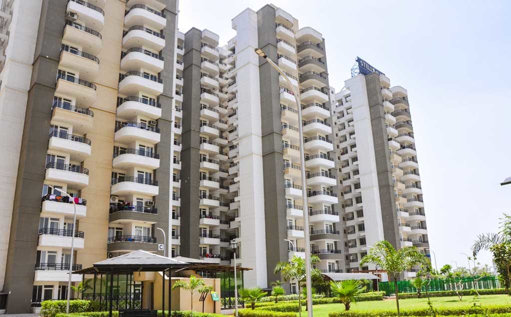 2BHK apartment in Stellar MI Citihomes, Omicron-III, Greater Noida, featuring luxury amenities like swimming pool, gym, clubhouse, and outdoor courts.