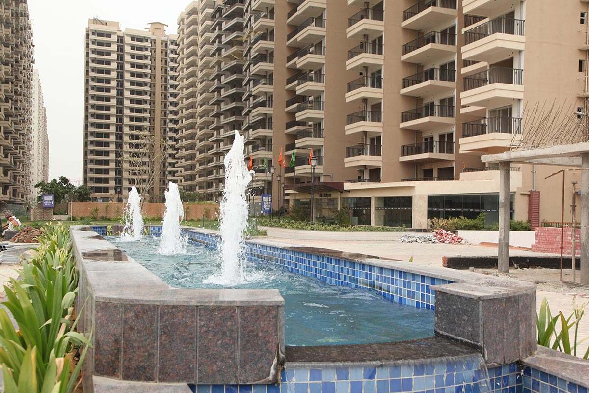 1665 sqft 4BHK apartment in GAUR ATULYAM, OMICRON-I, Greater Noida, with gym, swimming pool, and spacious layout.